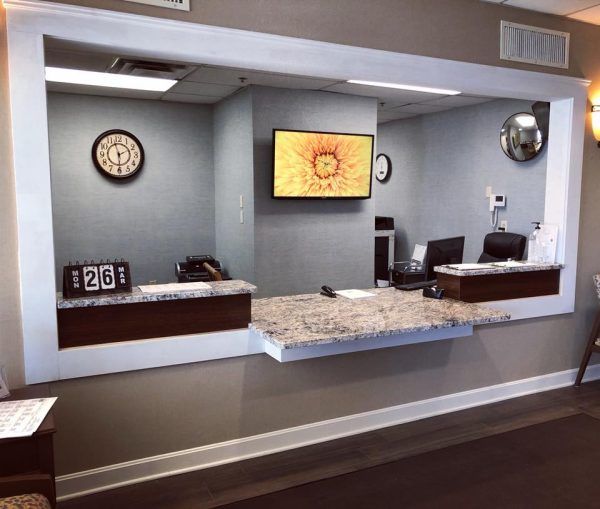 Embassy of Rockport's front desk and reception area