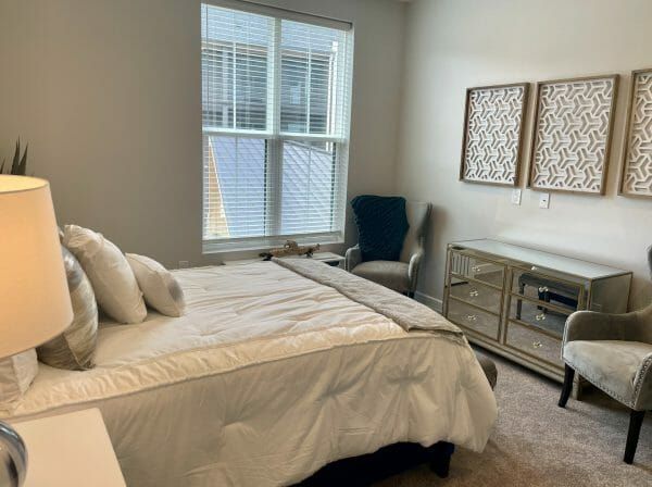 The bedroom of a model apartment at Thrive at Montvale