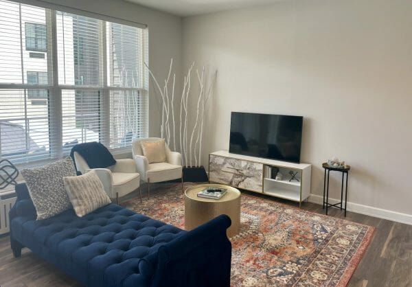The living room of a model apartment at Thrive at Montvale