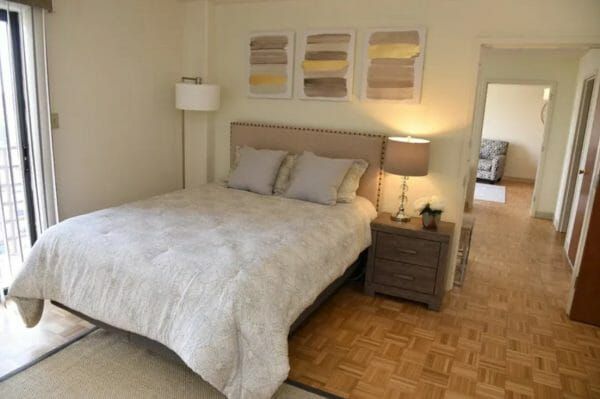 The bedroom of a model apartment at Harbour View Senior Living Community