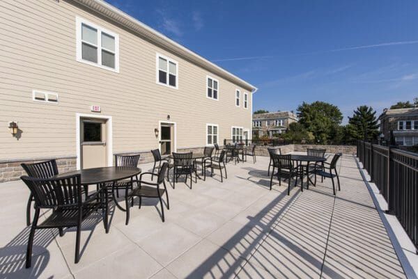 Heritage Run at Stadium Place Outdoor Patio with dining ; metal outdoor chairs and tables