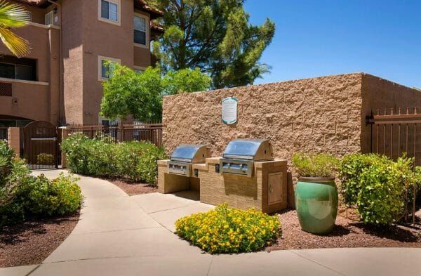Court Senior Apartments' two built-in propane grills and outdoor kitchen area by the pool