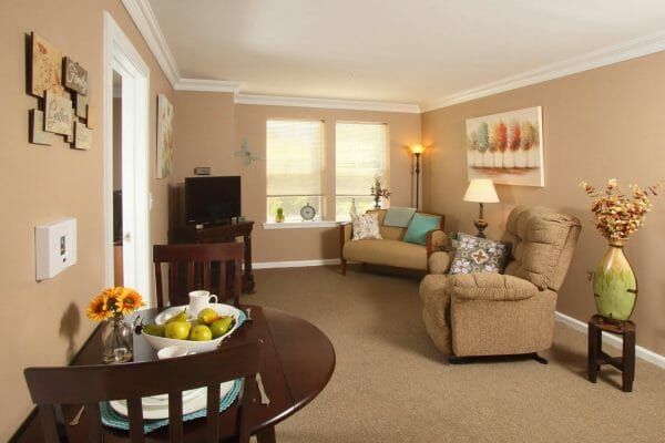 Monmouth Crossing Assisted Living's model apartment living and dining areas