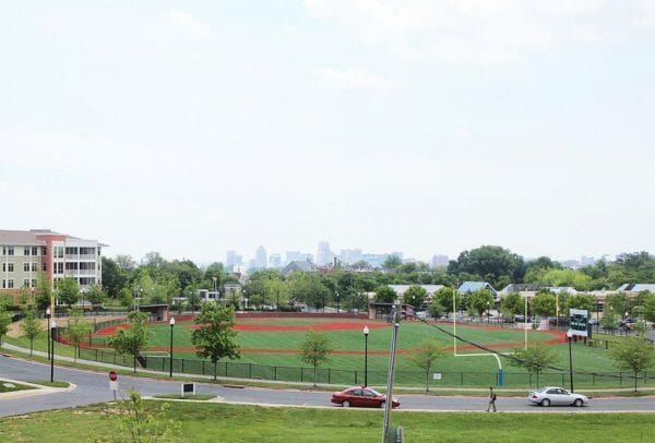Heritage Run at Stadium Place view of the ball field from the community with the downtown cityscape of Baltimore in the distance